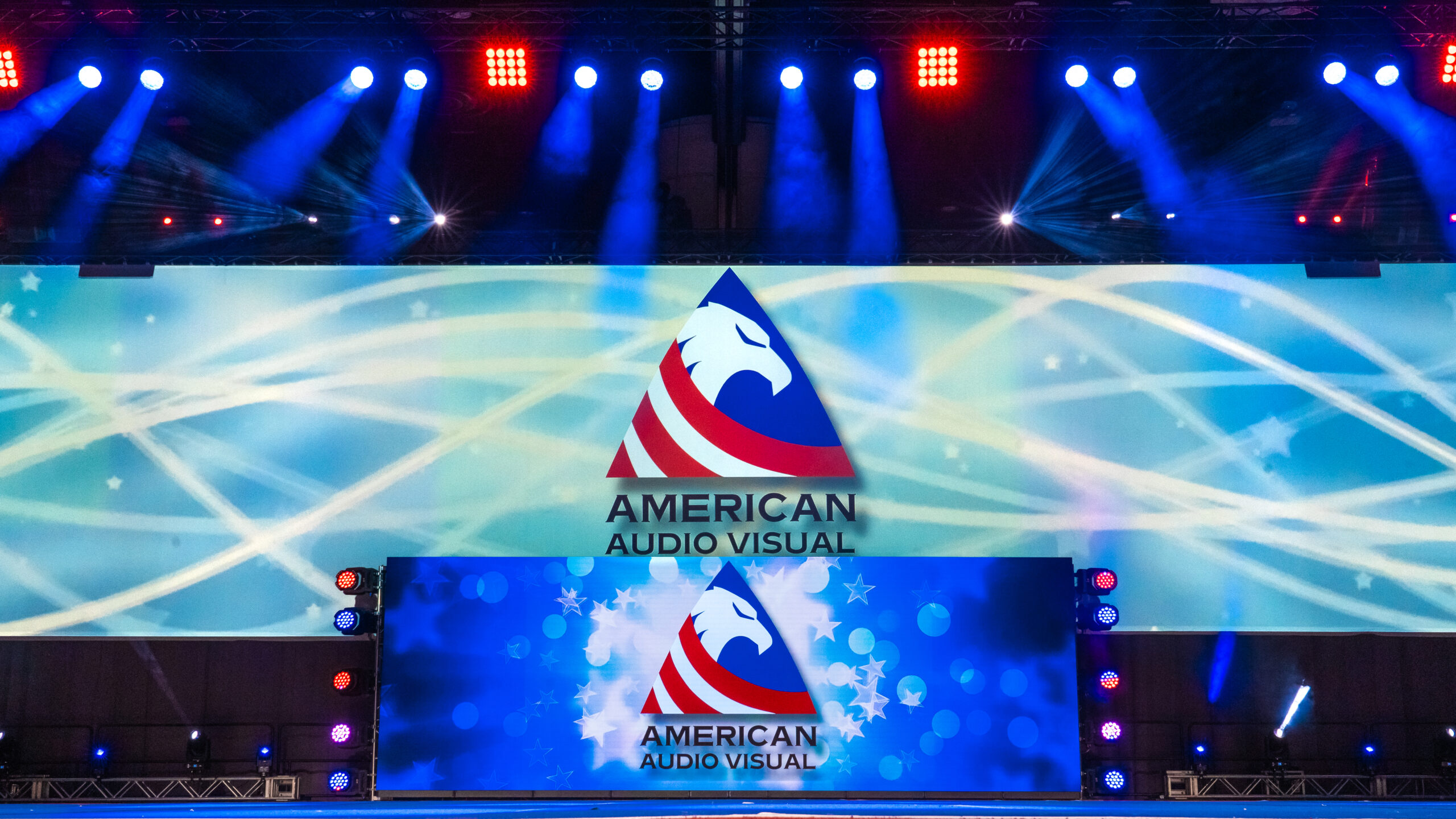 National cheerleading championship stage setup with advanced AV equipment, vibrant lighting, and seamless event production by American Audio Visual.